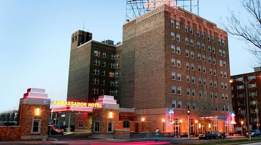 Ambassador Hotel Milwaukee historic Art Deco exterior illuminated at night