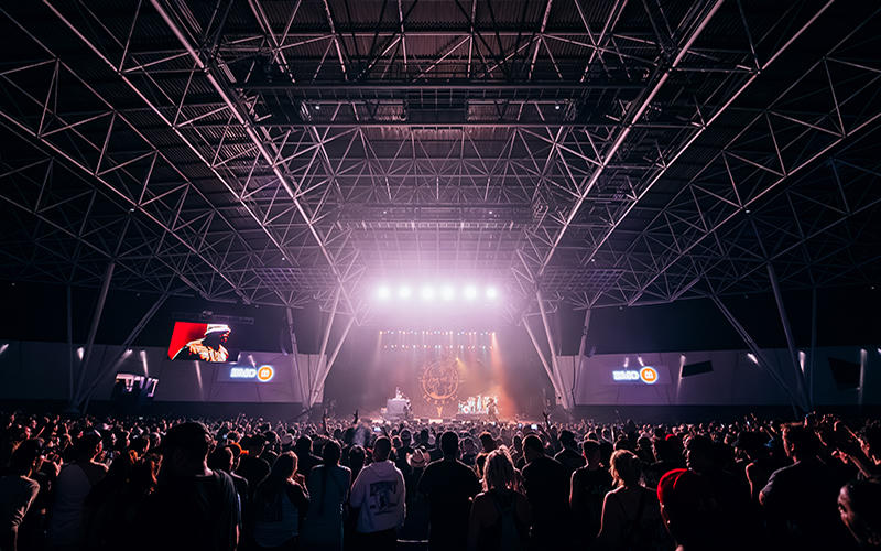 Indoor pavilion stage performance at Summerfest